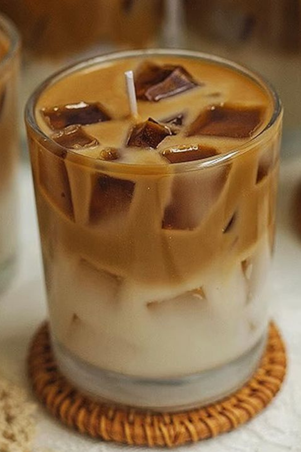 SugarBloom Salted Caramel Iced Latte scented candle in a glass with coffee-style wax ice cubes